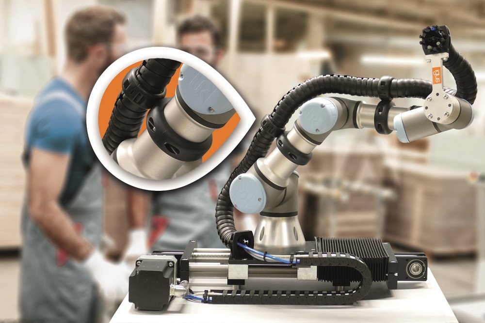 New plastic clamp concept from igus® for triflex® R energy chains on cobots